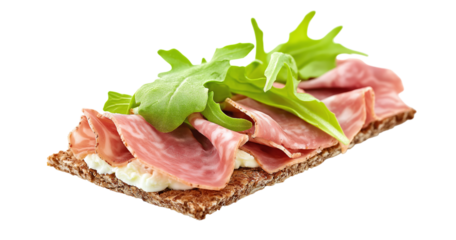 Whole grain crispbread with sliced salami and fresh green arugula leaves isolated on a transparent background