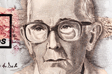 Carlos Drummond de Andrade a closeup portrait from Brazilian money
