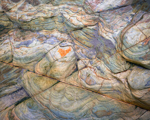 Abstract background of colorful stony minerals