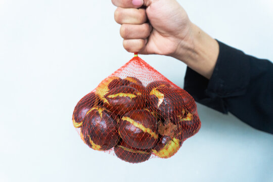 Jengkol or jering (Archidendron pauciflorum). Also known as blackbead, dogfruit, djenkol. White background. Food. Fresh smell.