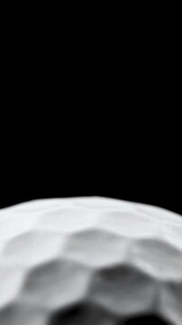 Closeup of rotating golf ball with copy space