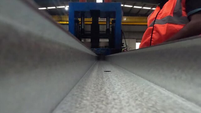 Morbi, Gujarat, India 12 09 2025: Drone view of many roll forming machine in factory.

