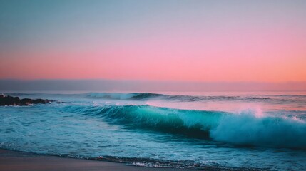 Fototapeta premium A serene seascape at dusk with ocean waves rolling towards a sandy shoreline and a colorful sky