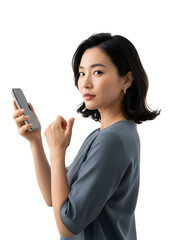 Confident young businesswoman engages with her smartphone, representing modern digital communication, professional networking, and successful technological interaction in contemporary society