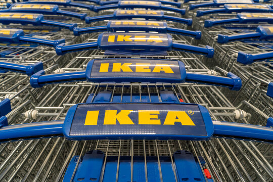 Ikea shopping carts stacked in a row at retail store