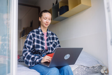 Person employs stylus to creatively alter visual material