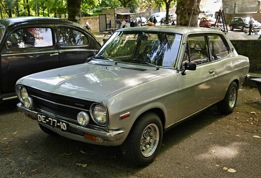 Datsun 120Y silver classic car coupe at show