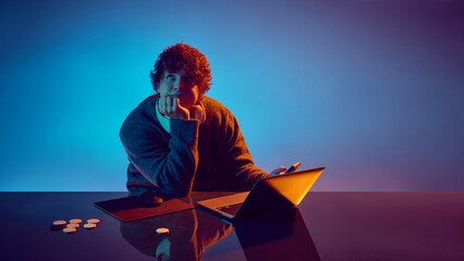 Young man thinking quietly during online casino moment. Concept of reflection, risk evaluation, emotional neutrality and practical behavioral patterns used in gambling UX and marketing.