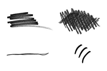 Set of four black charcoal pencil scribbles and strokes isolated on transparent background