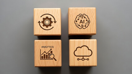 Wooden blocks with laser engraved icons representing technology and digital concepts