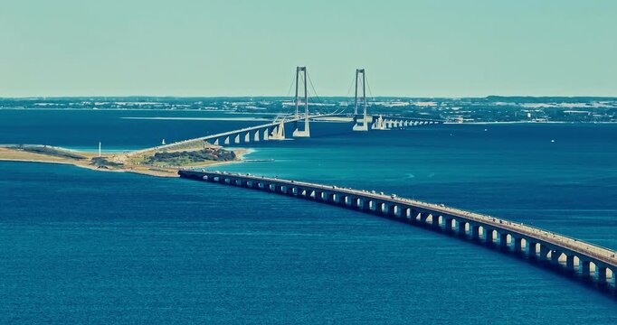 Aerial view of Great Belt Bridge at summer. The iconic sea crossing. Denmark modern engineering design. Denmark