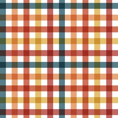Seamless autumnal warm color plaid pattern background.