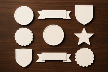 White blank badge, ribbon, star and shield shapes with soft shadows on wooden surface in top view layout for design template or branding concept. Ai generative