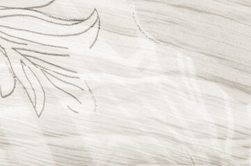 Delicate floral pattern on flowing fabric in soft neutral tones