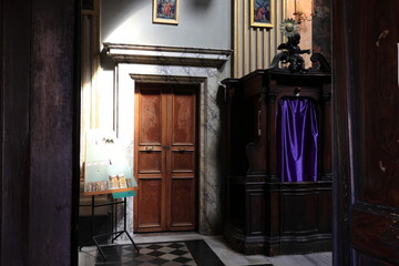 San Pantaleo Church Interior Detail with Wooden Door and Confessional in Rome, Italy