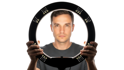 A man holding a ring light