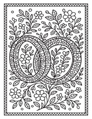 Intricate floral design with intertwined wedding rings and blooming flowers