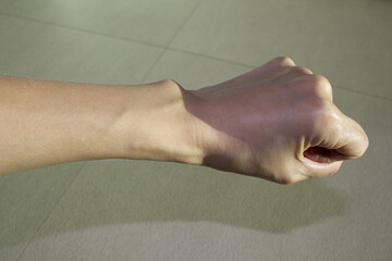 It's a woman's clenched fist.