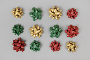 Set of colorful bows on a gray background. A greeting composition for holidays, Christmas, and Valentine's Day