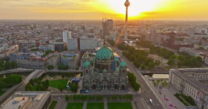 Aerial view of Famous Berlin cathedral at sunrise with famous television tower is in the background. Berlin, Germany