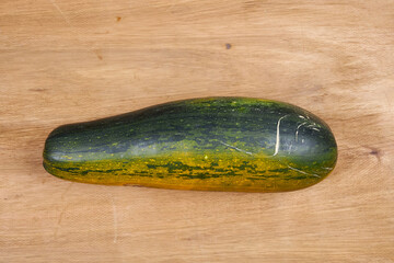 Autumn harvest, vegetables and fruits lie on a wooden table.