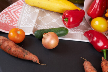 Autumn harvest, vegetables are lying near the basket.