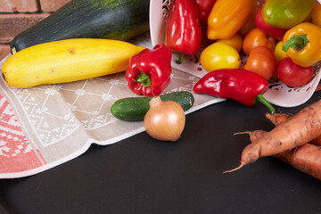 Autumn harvest, vegetables are lying near the basket.