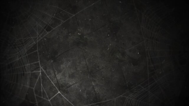 rugged cinematic background, uneven dark concrete surface with circular impressions