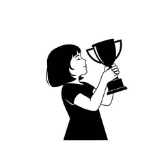 Young girl proudly holding a trophy celebrating her achievement.