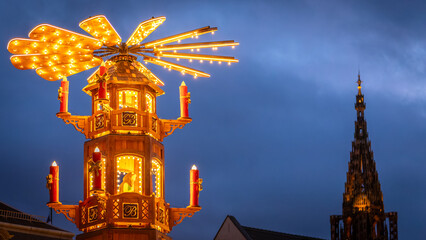 Christmas decorations and Cathedral in the city of Strasbourg at the end of the day in Strasbourg...