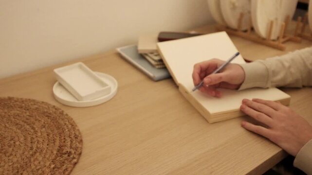 Beautiful light slow motion video. Gratitude journal, mental self care, mindfulness, self reflection, creatine writing. Concept of education, self planning, to do list.