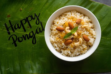 Pongal rice served on a banana leaf.