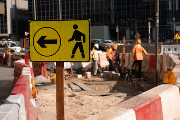 Repair of city road. Road works with traffic signs