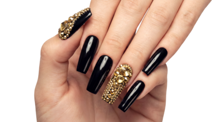 Elegant female hand showcasing long black coffin nails with sparkling gold rhinestone embellishments ideal for luxury beauty and fashion concepts