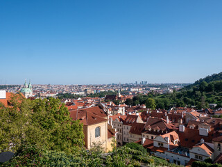 Fototapeta premium Panoramic view over the city of Prague from the top area of Prague Castle.