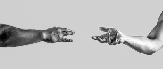Two hands, helping arm of a friend, teamwork. Helping hand concept and international day of peace, support. Helping hand outstretched, isolated arm, salvation. Close up help hand