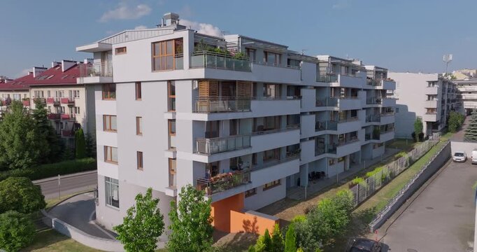 Contemporary residential building in Poland, symbolizing urban housing development, real estate market growth, and modern European architecture.