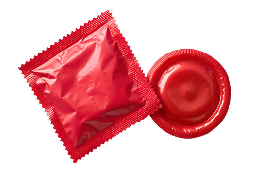 Red Condom with Foil Wrapper Packet Unrolled Reservoir Tip Isolated White Background