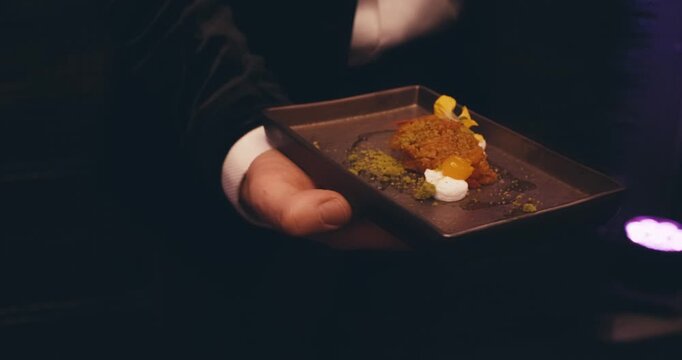 modern presentations of haute cuisine, European food establishments, restaurants with Michelin star. minimalist decoration, original serving of food. dark background professional lighting