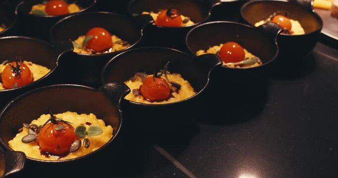 modern presentations of haute cuisine, European food establishments, restaurants with Michelin star. minimalist decoration, original serving of food. dark background professional lighting