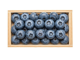 Isolated crate of ripe blueberries, nutrient-rich superfood in a wooden container, delicious
