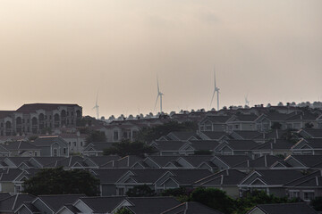 Wind turbines at cityscape