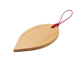 Isolated wooden leaf shaped tag tied with red thread, a sustainable product decoration