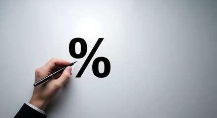 Hand with pen interacts with percentage symbol, showing financial concept.