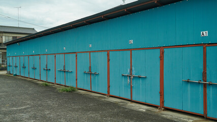 Blue container box warehouses positioned side by side
