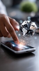 Hand interacting with smartphone on desk with global digital marketing interface