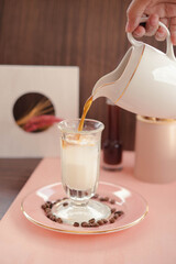 pouring milk into a glass