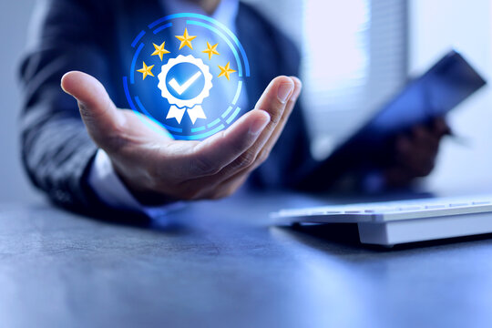 Product certification concept with a businessman holding certified mark to qualified quality standard requirement and passed audit according to industrial standards