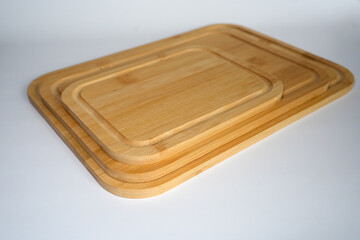 An elegant and practical set of three different-sized cutting boards, crafted from eco-friendly natural bamboo.
