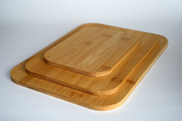 An elegant and practical set of three different-sized cutting boards, crafted from eco-friendly natural bamboo.